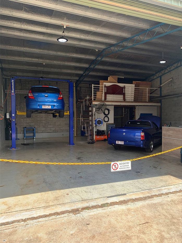 Cars in the Garden City Auto Air workshop in Toowoomba